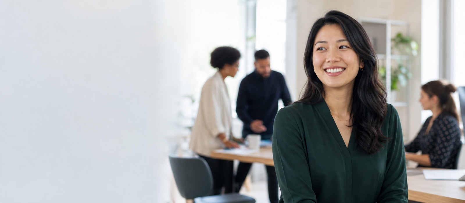 A mission-driven professional collaborating in a bright office.